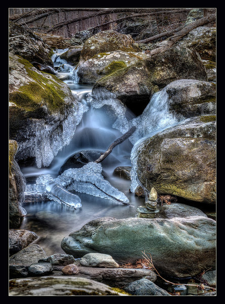 Frozen waterfalls and a rock stack at Rose River, VA.