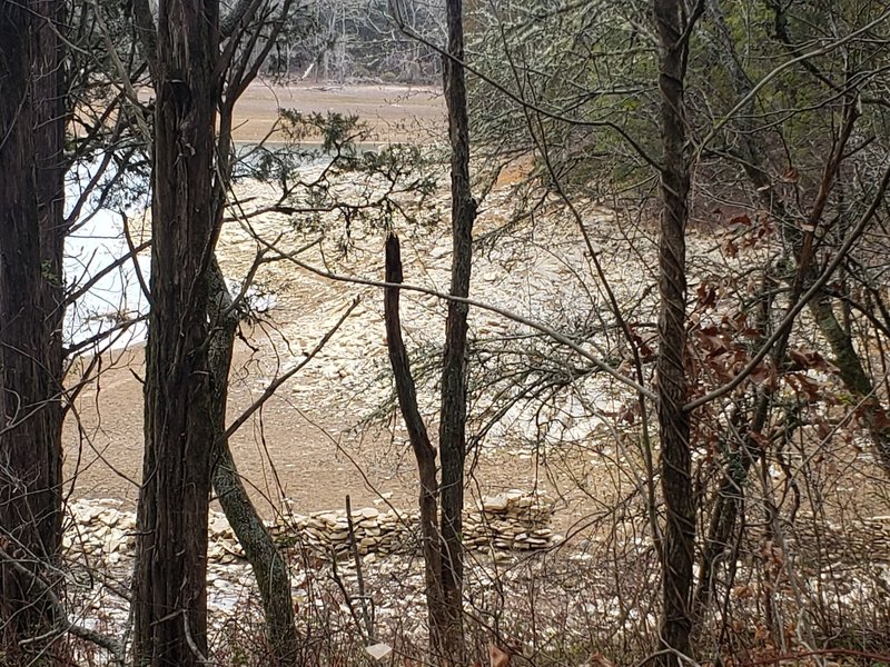 Stone wall normally covered in water in Norris Lake. Likely built some time in the 19th century.