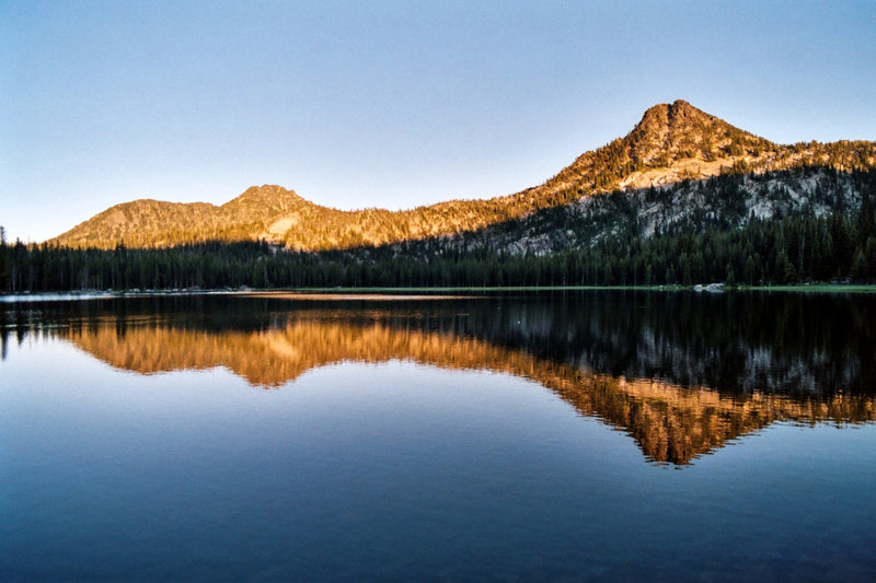 Sunset glow on Gunsight Mountain. Location is approximate.