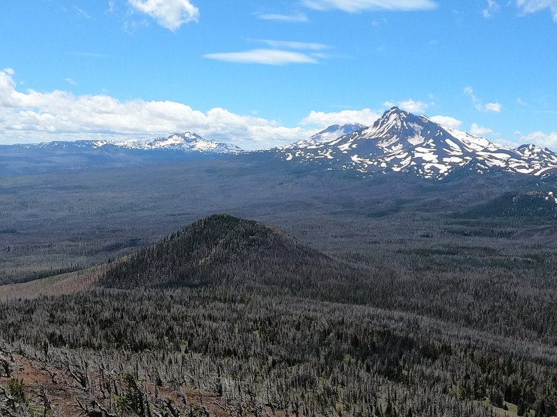 Two of the 3 Sisters and Broken Top looking south from Black Crater summit.