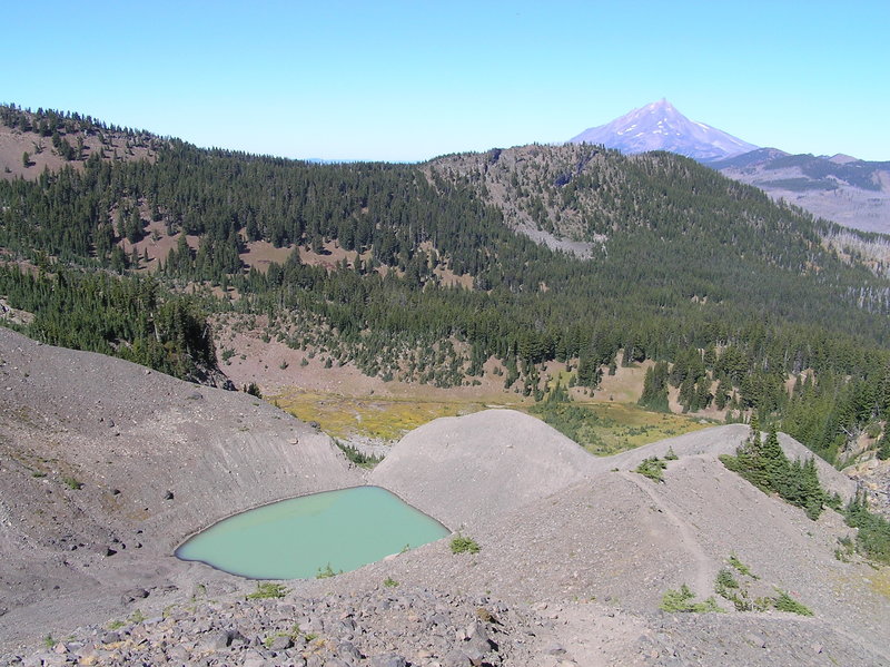 View north from trail to saddle showing tarn, Upper Canyon Meadow and Mt. Jefferson.