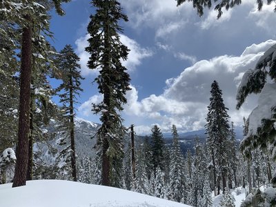 A breathtaking overlook of the peaceful, pristine winter landscape of Lassen Park on a gorgeous day.