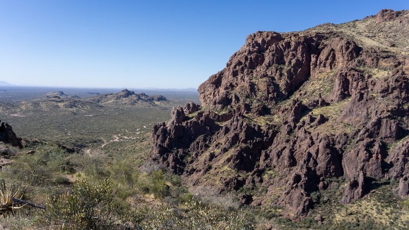 Black cliffs over the Peralta Trailhead.