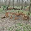 Intersection of Miles and Hermann Trails, southeast corner. One of three places with abandoned farm equipment.