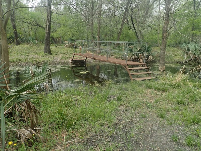 There is a bridge crossing over Turkey Creek south of the Archery area. The GPS coordinates here are 29.82025 -95.58697.