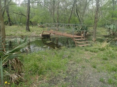 There is a bridge crossing over Turkey Creek south of the Archery area. The GPS coordinates here are 29.82025 -95.58697.