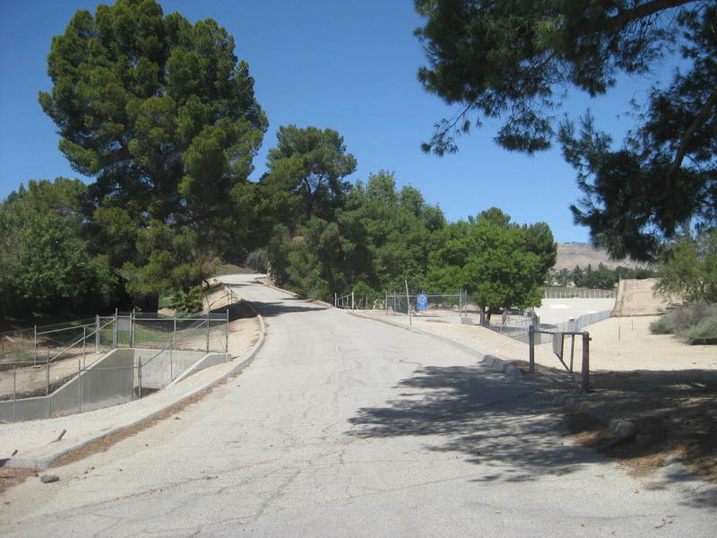 Climb briefly past flood control dam.