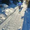 Skiing the long gradual run down O'Connor Creek Valley.