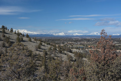 High desert and snowy cascades create a cool contrast.