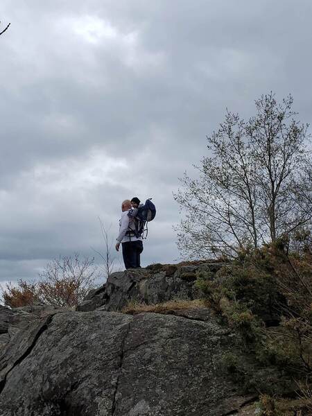 Hikers on the Canadian Shield lookout point.