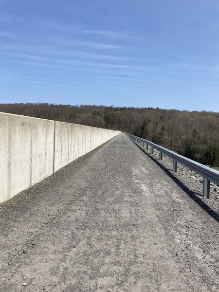 Walk across the dam to connect to the east and west shore trails.