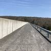 Walk across the dam to connect to the east and west shore trails.