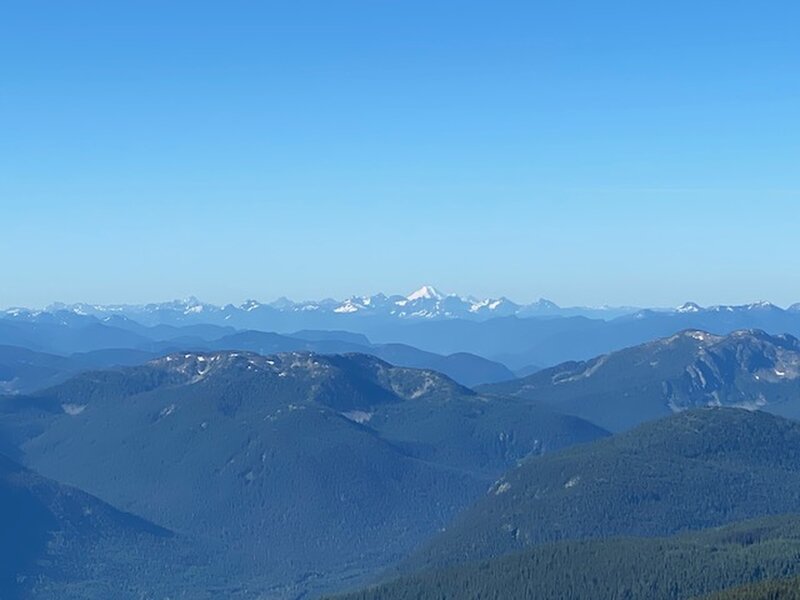 Views looking Southwest from Stoyoma Mountain. Long distance view of Mount Baker with the Cheam range in front.