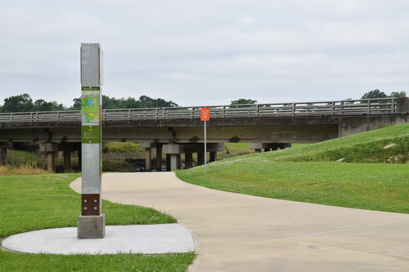 Trailhead marker near the bridge