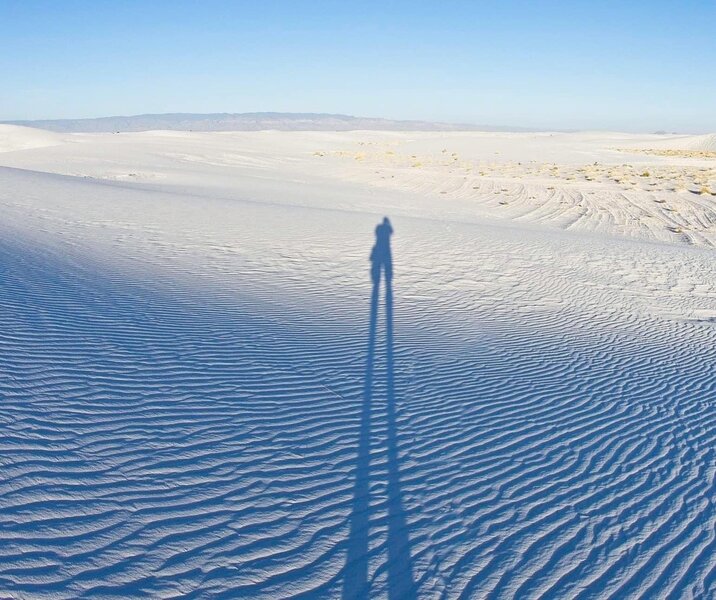 Long shadows and white sands ripples.