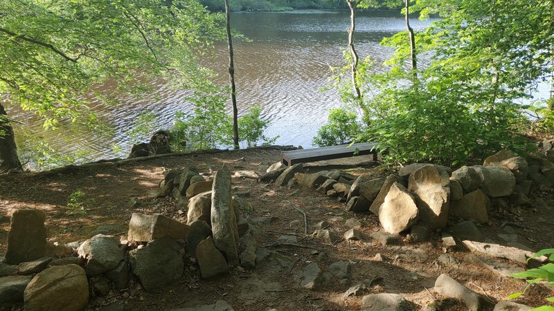 One of many benches and fishing spots along the river.