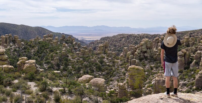 A hiker looking out from Massai Point.