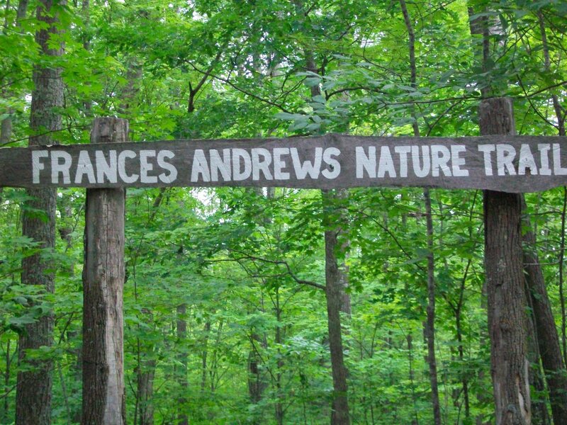 Trail sign welcomes people to start on the Frances Andrews trail.