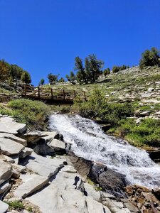 Bridge over rushing water on the way up to Island Lake.