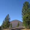 Cinder Cone comes into view when hiking south from the Butte Lake trailhead on Butte Lake to Snag Lake Trail (West).