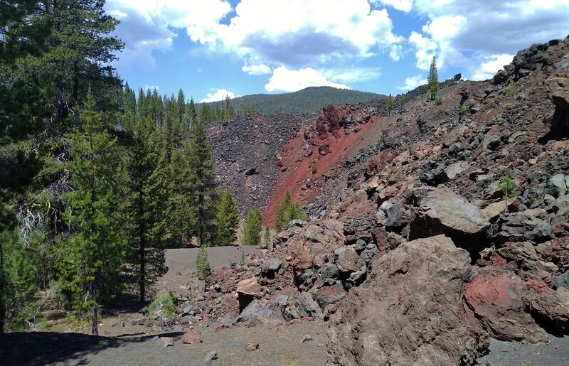 Butte Lake to Snag Lake Trail (West) passes right next to Fantastic Lava Beds (right). Ahead to the northwest, looms forested Prospect Peak.