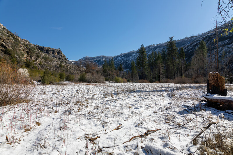 A snow covered meadow along the Tuolumne River.