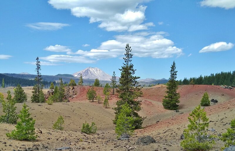 Hiking through the Painted Dunes with Lassen Peak in the distance.