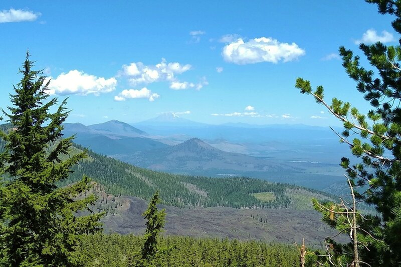 Looking northwest from the top of Prospect Peak, in the far distance, over 70 miles away, is Mt. Shasta, 14,179 ft. (just left of center).