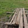 The makeshift "bridge" over a section of trail that's almost always muddy or flooded.