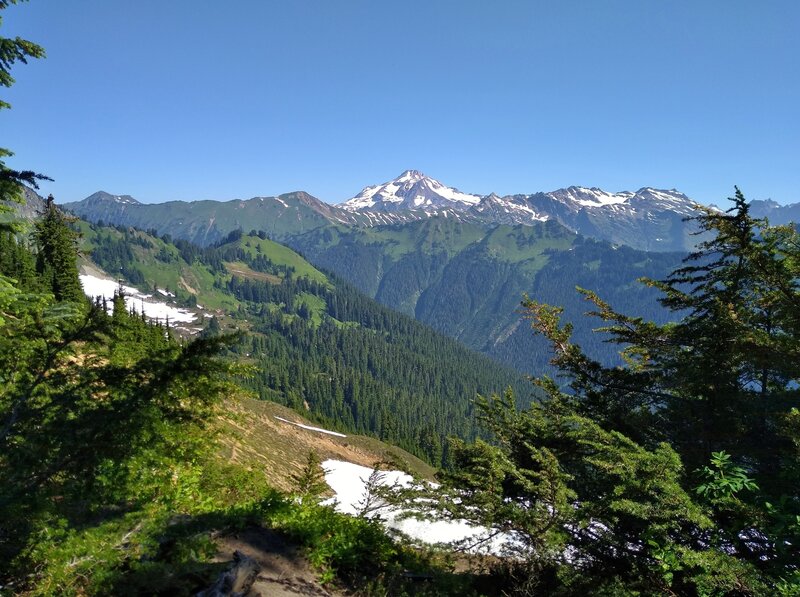 Snowy Glacier Peak is in the distance to the north, seen from a lookout at the Bald Eagle/Blue Lake High Trail junction.