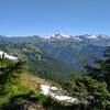 Snowy Glacier Peak is in the distance to the north, seen from a lookout at the Bald Eagle/Blue Lake High Trail junction.