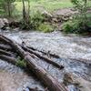 Log crossing with higher water.