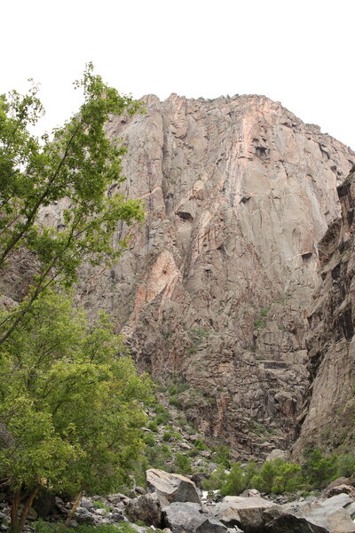 Looking back up at the painted wall from the banks of the Gunnison River