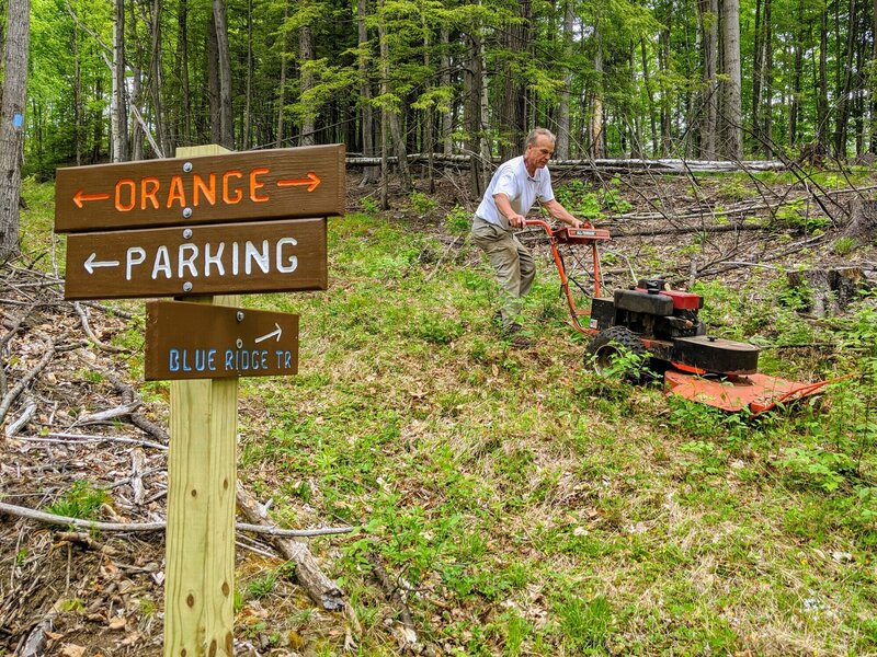 Garth brush-hogging the Blue Ridge Trail