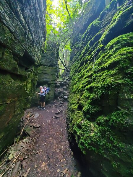 Man and baby in the ravine.