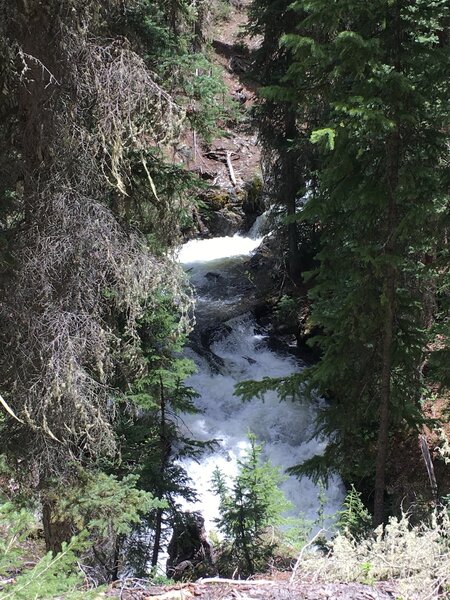 The roar of the cascade draws you to this overlook.