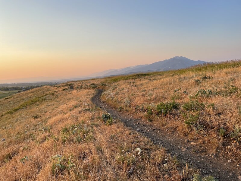 Hazy sunset view of Bridgers from Painted Hills Trails.