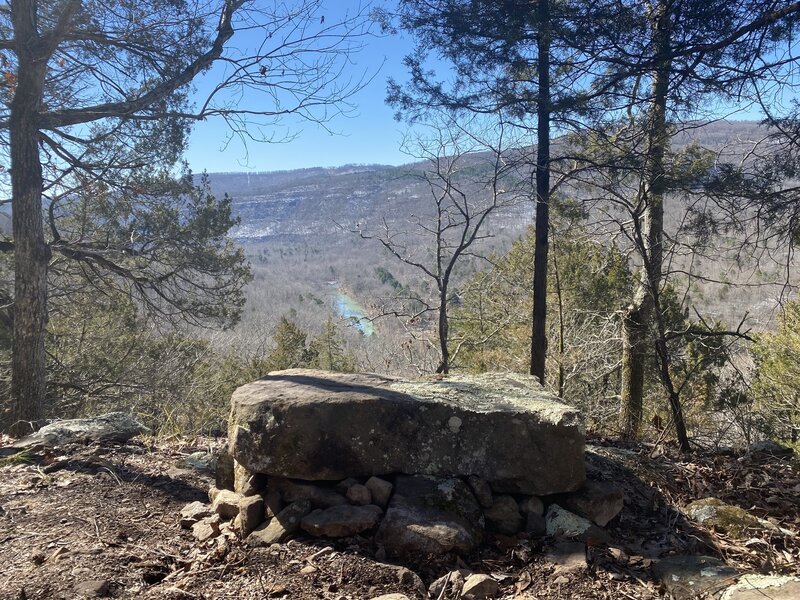 Rock bench overlooking the Archey Fork River at the end of the trail.