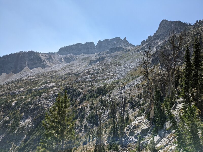 Looking uphill at climb, trail heads through the u shaped gap/saddle at top, a bit steep but wow what a view.