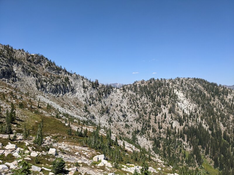 View of trail switchbacking up slope.