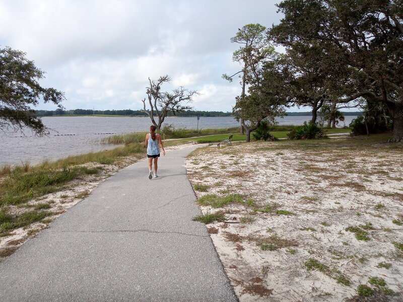 Nice paved walking path along side of Bayou Grande in Pensacola Florida. Benches for relaxing and watching the birds.