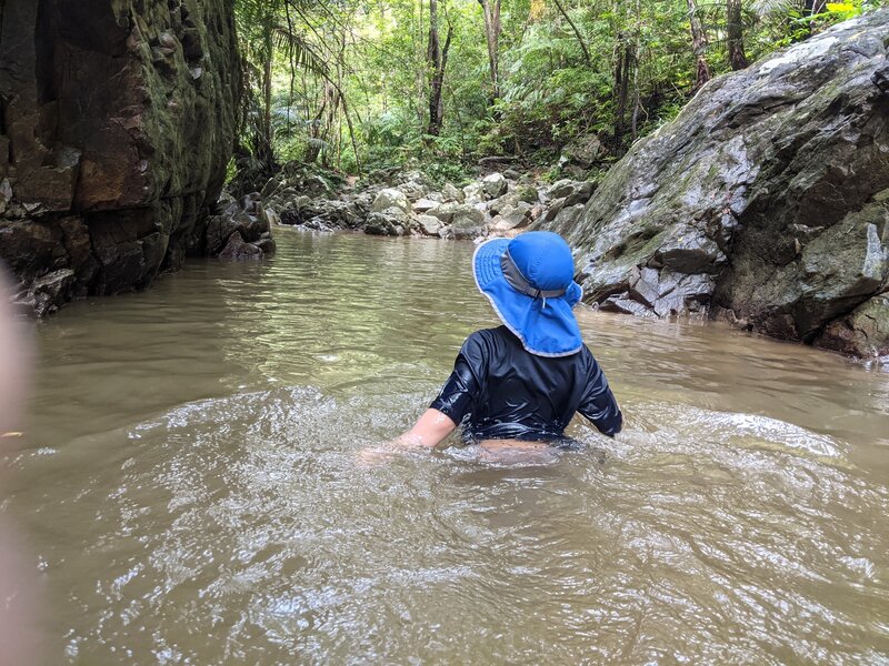 Wading through water.