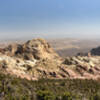 The back side of Bridge Mountain and Rainbow Mountain from North Peak.