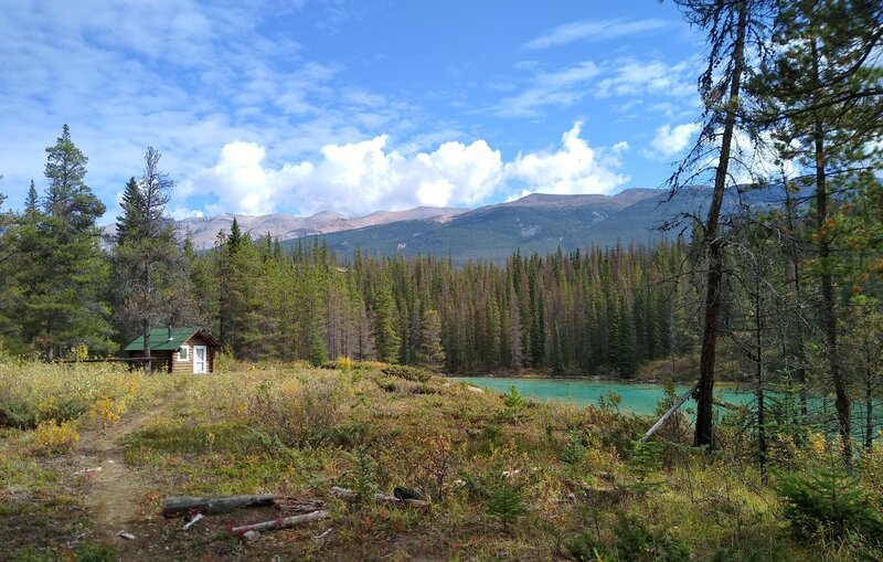 Chaba Warden Shelter at turquoise Long Lake, fed by the Athabasca River.