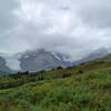 Left to right - Athabasca Glacier, Snow Dome (hidden in clouds), Dome Glacier, Mt. Kitchener, and Mt. K2, looking southwest past meadows of Mount Wilcox. Snow Dome, the North American triple divide, sends water to the Arctic, Pacific, and Atlantic Oceans.