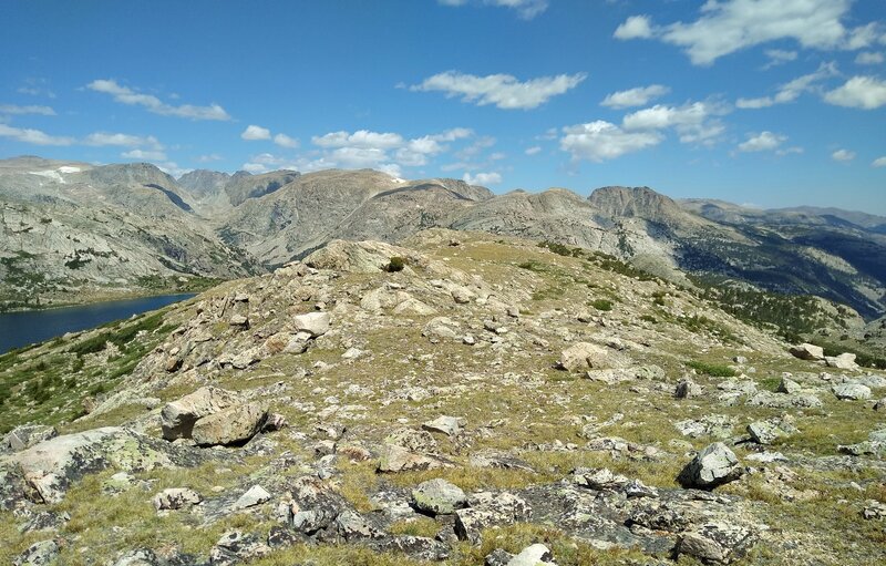 On the low ridge just west of Hay Pass, Dennis Lake and the Golden Lakes valley stretch into the distance to the northwest (left), to the far right/northeast is the Middle Fork Bull Lake valley, and Mt. Quintet is the massif ahead in the center.