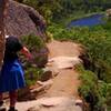 Narrow trail with a metal rebar crossing, 100 feet up with a view of the ocean. Sheer cliff, very slippery when wet.