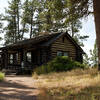 The trail passes by this cabin before it starts descending into the canyon.