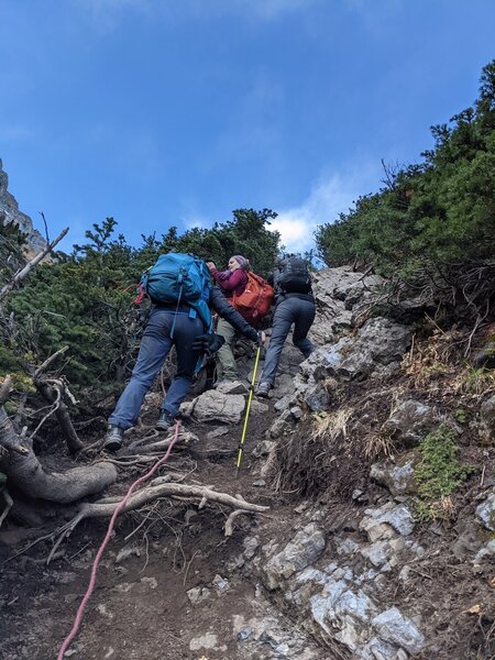 Making use of the available rope to navigate a tricky section.