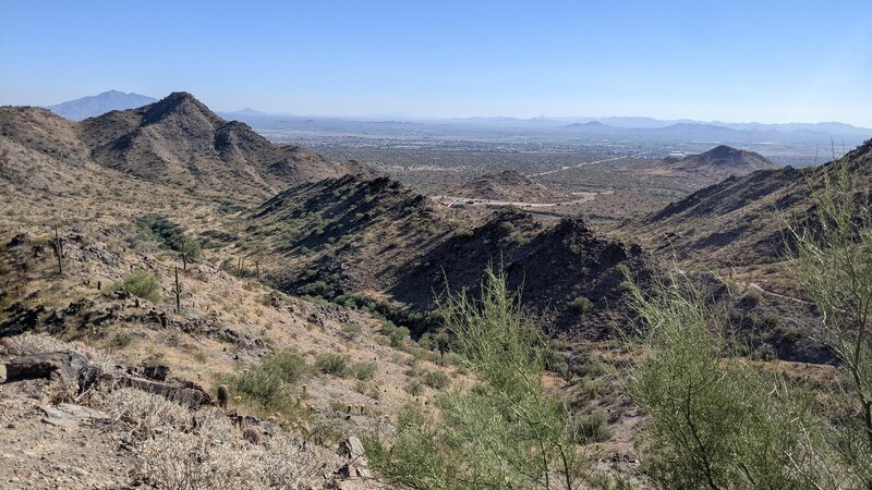 Climb the rock pile to the top where the two trails meet for a better view.